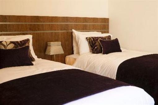 фото отеля Rooms at the Apple Pie