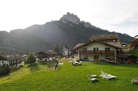 фото отеля Hotel Touring Pozza di Fassa