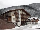 фото отеля Hotel Touring Pozza di Fassa