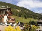 фото отеля Hotel Touring Pozza di Fassa