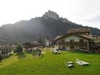 фото отеля Hotel Touring Pozza di Fassa