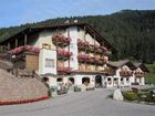 фото отеля Hotel Touring Pozza di Fassa