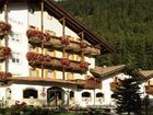 фото отеля Hotel Touring Pozza di Fassa