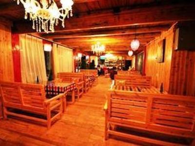фото отеля Shangri-la Cozy Inn