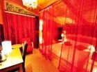 фото отеля Shangri-la Cozy Inn