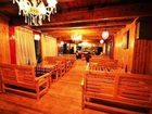 фото отеля Shangri-la Cozy Inn