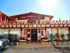 фото отеля Shangri-la Cozy Inn