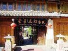 фото отеля Lijiang Xing Xing Dian Deng Inn