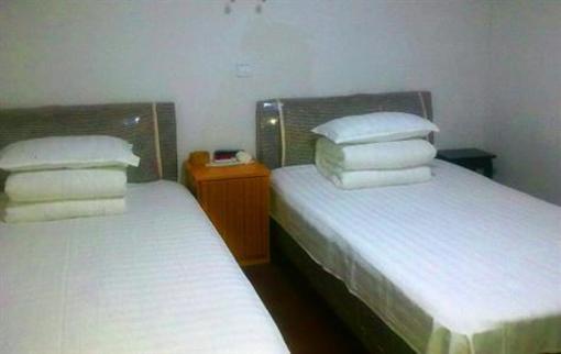 фото отеля Songhetang Hostel