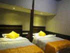 фото отеля Songhetang Hostel