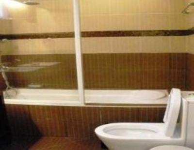 фото отеля Twin Pines Suites