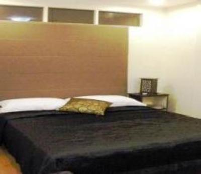 фото отеля Twin Pines Suites