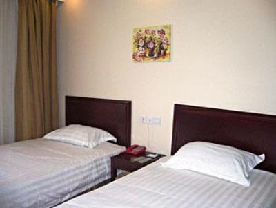 фото отеля Green Tree Inn (Qingdao Shengleyuan)