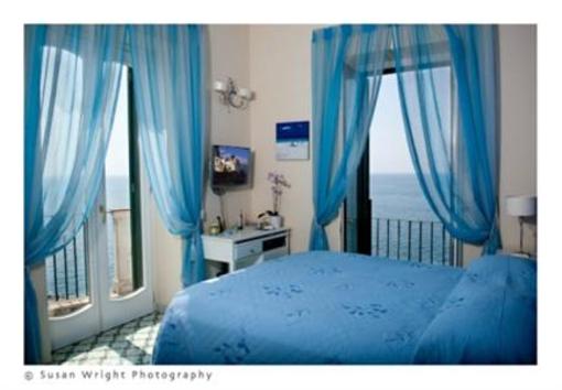 фото отеля La Scoglierarooms
