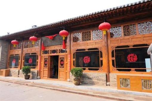 фото отеля Yiguan Minsu Inn