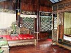 фото отеля Lijiang Liuliu Inn by Wind Station