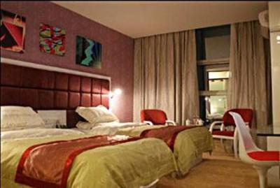 фото отеля Tian Lun Huang Chao Fashion Hotel
