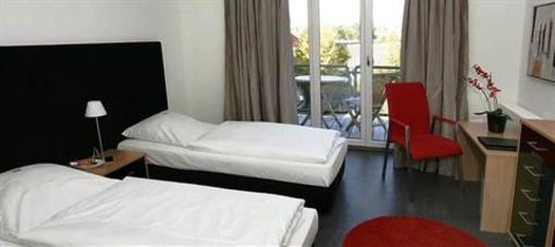 фото отеля Hotel am Hof Taufkirchen