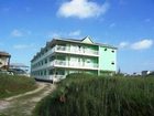 фото отеля Beachgate CondoSuites and Motel