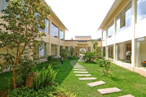 фото отеля Tengchong Airport Sightseeing Hotel