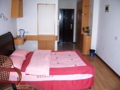 фото отеля Lehaojia Apartment Hotel Shida