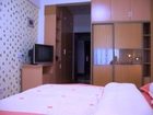 фото отеля Lehaojia Apartment Hotel Shida