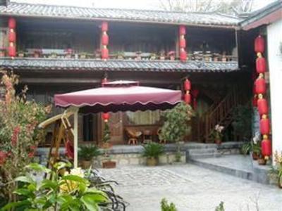 фото отеля Lijiang Guxiang Ancient Homes Inn