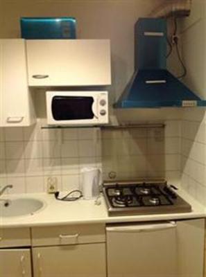 фото отеля Dam Square Experience Apartment