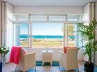 фото отеля Breakfast on the Beach Lodge
