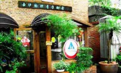 фото отеля Huxiangyi Youth Inn