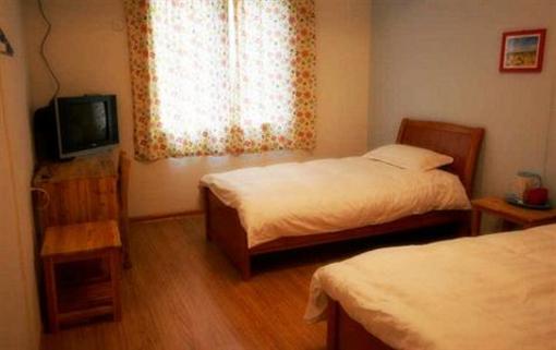 фото отеля Huxiangyi Youth Inn