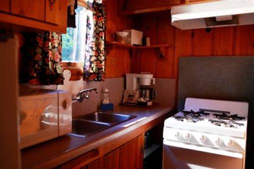 фото отеля Sleepy Hollow Cabins and Motel