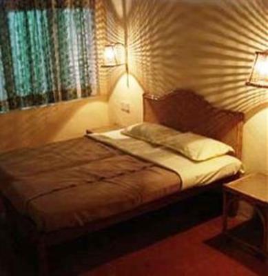 фото отеля Snooze Inn Kodaikanal
