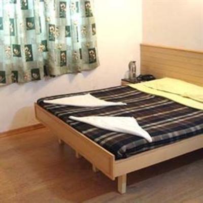 фото отеля Snooze Inn Kodaikanal