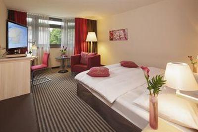 фото отеля Moevenpick Hotel Munchen-Airport