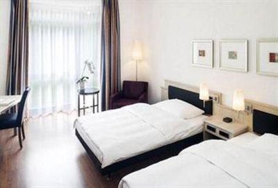 фото отеля Moevenpick Hotel Munchen-Airport
