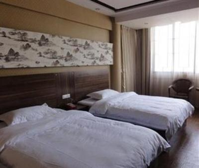 фото отеля Lizhuang Guyun Holiday Hostel