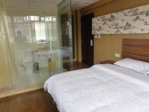 фото отеля Lizhuang Guyun Holiday Hostel
