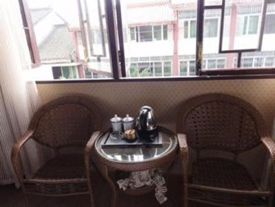 фото отеля Lizhuang Guyun Holiday Hostel