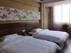 фото отеля Lizhuang Guyun Holiday Hostel