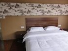 фото отеля Lizhuang Guyun Holiday Hostel