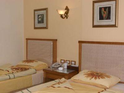 фото отеля Alokhowa Hotel