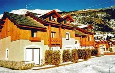 фото отеля Madame Vacances Les Chalets du Jardin Alpin