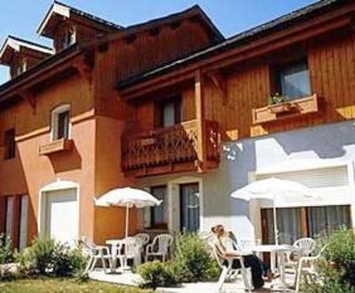 фото отеля Madame Vacances Les Chalets du Jardin Alpin