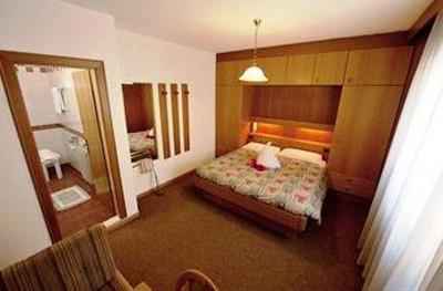 фото отеля Hotel Ladina Campitello di Fassa