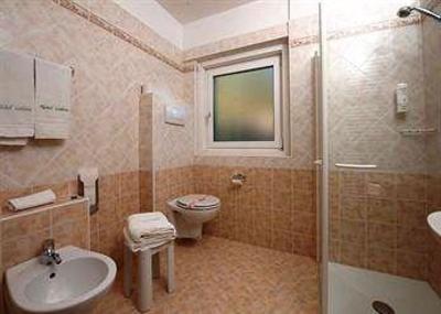 фото отеля Hotel Ladina Campitello di Fassa