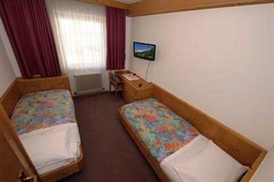 фото отеля Hotel Ladina Campitello di Fassa