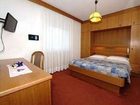 фото отеля Hotel Ladina Campitello di Fassa