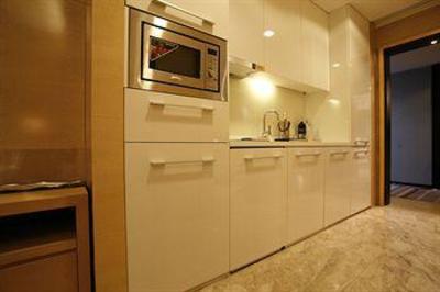 фото отеля Poly World Trading Center Serviced Apartment