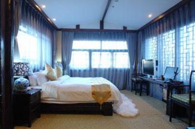 фото отеля Lijiang Shishan House